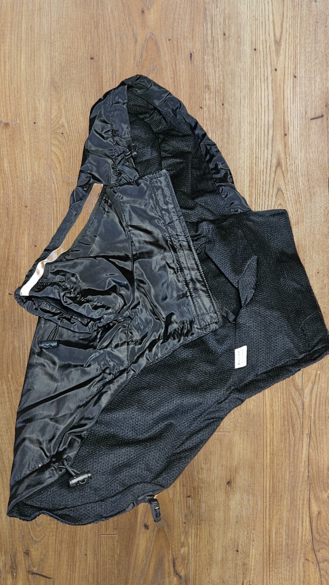 Black raincoat with hood and drawstrings image 1